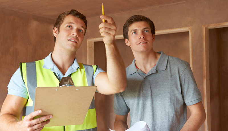 illinois home owner-And-Inspector-looking at home